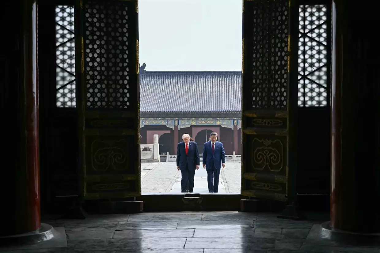 China's President Xi Jinping (right) and President Trump visit the Temple of Heaven on Thursday in Beijing.