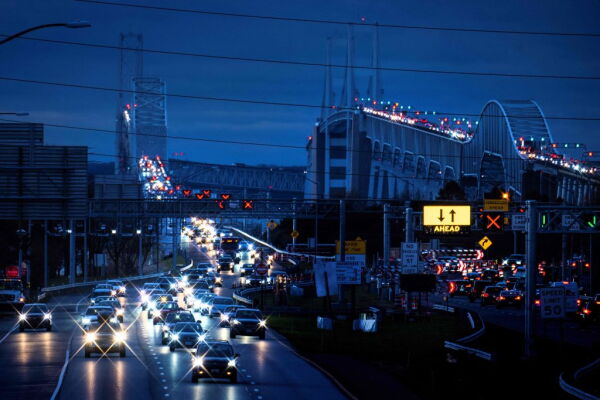 Cars cross the Bay Bridge over the Chesapeake Bay in Stevensville, Md., on Nov. 22, 2023, ahead of the Thanksgiving holiday.