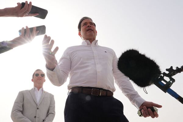 US Secretary of State Marco Rubio speaks to journalists before boarding his plane at Indira Gandhi International Airport in New Delhi on May 25, 2026.