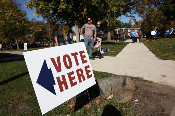 DETROIT, MICHIGAN - OCTOBER 19: Residents vote in early voting at a park building in Detroit on October 19, 2024 in Detroit, Michigan. Detroit is the first Michigan community to have early voting. Both Vice President Kamala Harris and former President Donald Trump have been campaigning in the key battleground state of Michigan. (Photo by Spencer Platt/Getty Images)