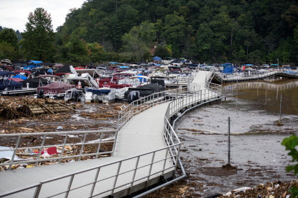 The Rocky Broad River flows into Lake Lure and overflows the town with debris from Chimney Rock, North Carolina after heavy rains from Hurricane Helene on September 28, 2024, in Lake Lure, North Carolina.