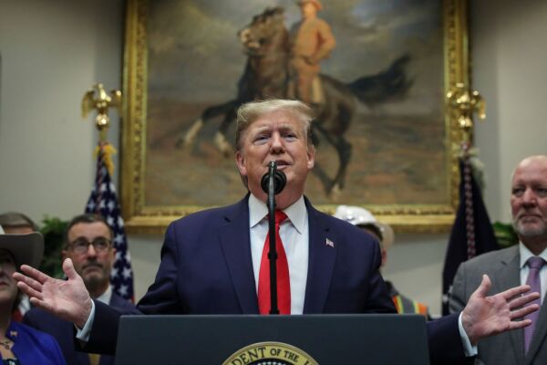 U.S. President Donald Trump speaks during an event to unveil significant changes to the National Environmental Policy Act, in the Roosevelt Room of the White House on January 9, 2020 in Washington, DC. The changes to the nations landmark environmental law would make it easier for federal agencies to approve infrastructure projects without considering climate change. President Trump also took several questions from reporters, including questions of Iran and impeachment.