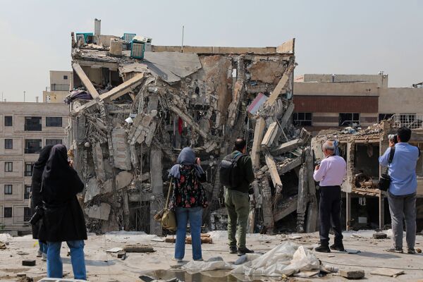 Representatives from more than a dozen foreign diplomatic missions, United Nations offices and the media view damage at sites previously targeted by U.S.-Israeli strikes in Tehran, Iran, on Monday.