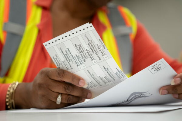 Absentee ballots are prepared to be mailed at the Wake County Board of Elections on Tuesday in Raleigh, N.C.