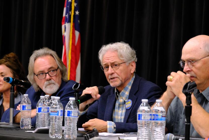Democrat Tom Begich discusses his education policy platform, with Independent Randy Hoffbeck (left) and Republican Click Bishop (right) at an education debate on July 30, 2026.