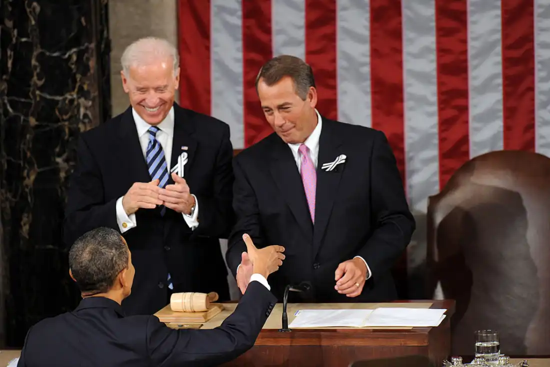 President Barack Obama is greeted by House Speaker John Boehner and Vice President Joe Biden prior to delivering his State of the Union address in January 2011 at the U.S. Capitol in Washington, D.C.