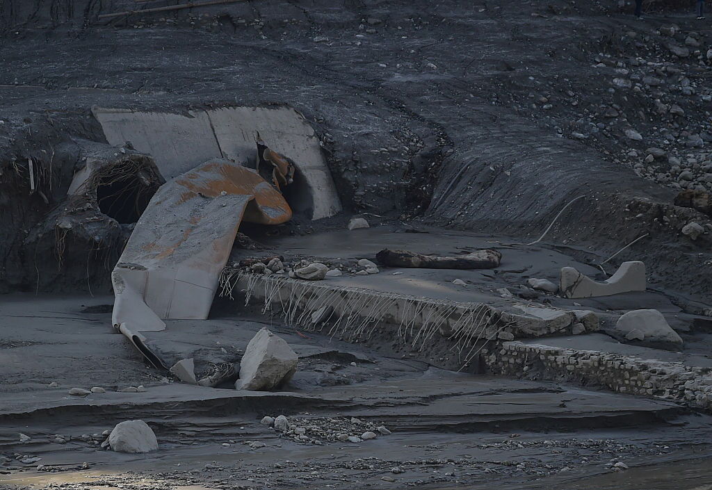 A week after the deadly floods in Nepal, rescuers work to find survivors