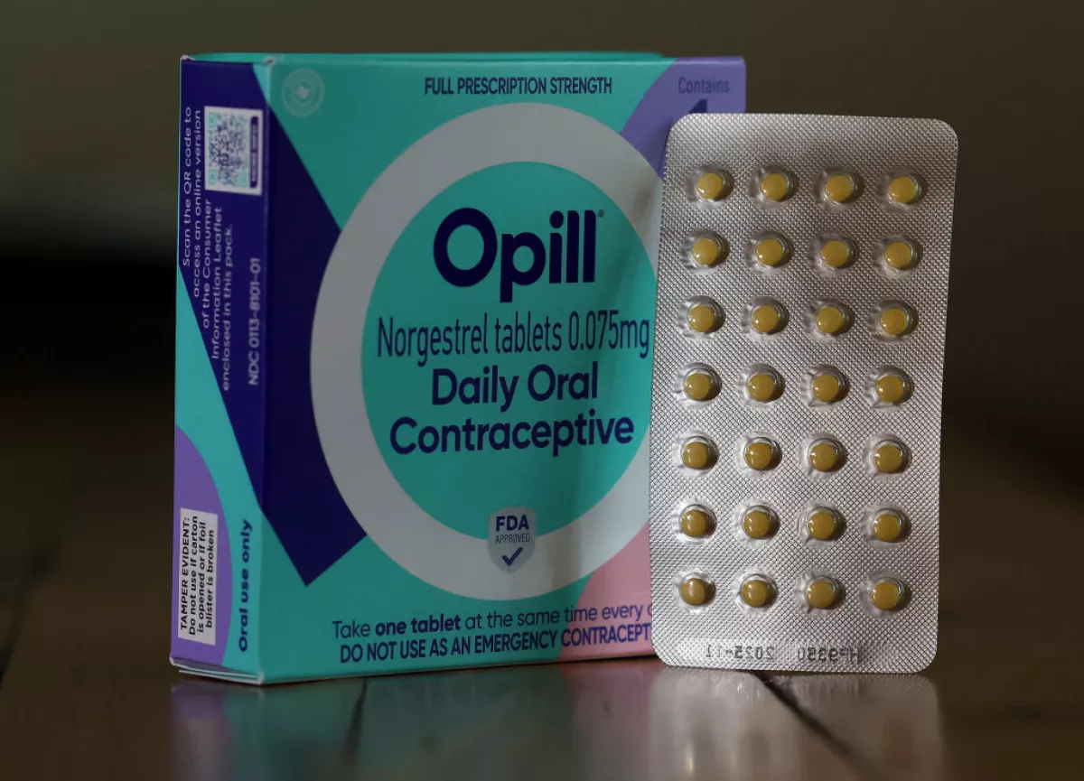 In this photo illustration, a package of Opill is displayed on March 22.
