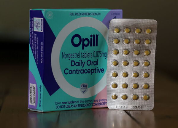 In this photo illustration, a package of Opill is displayed on March 22,