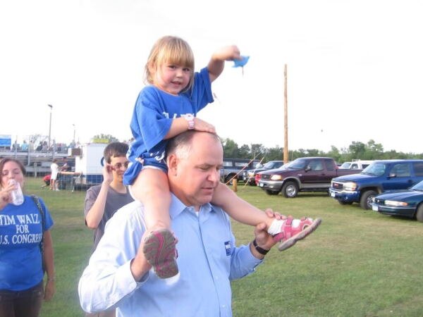 Tim Walz is seen campaigning with this daughter, Hope, on his shoulders in 2005.