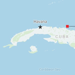 Cuba's military shot at a U.S.-registered boat Wednesday close to its shoreline, authorities said.