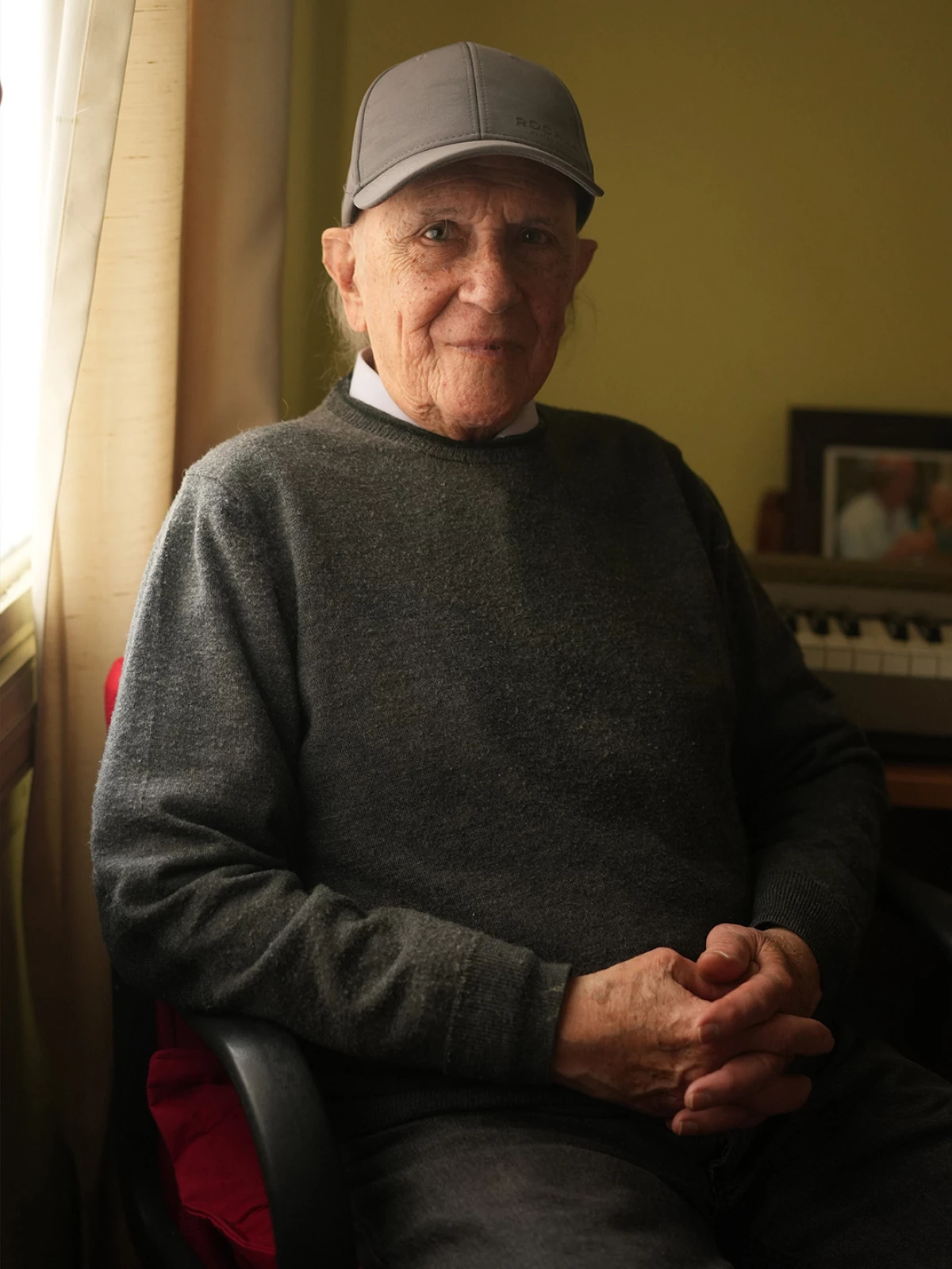 Pianist Miguel Loubet, the last surviving member of Los Wawancó, poses for a portrait on Aug. 1, 2024.