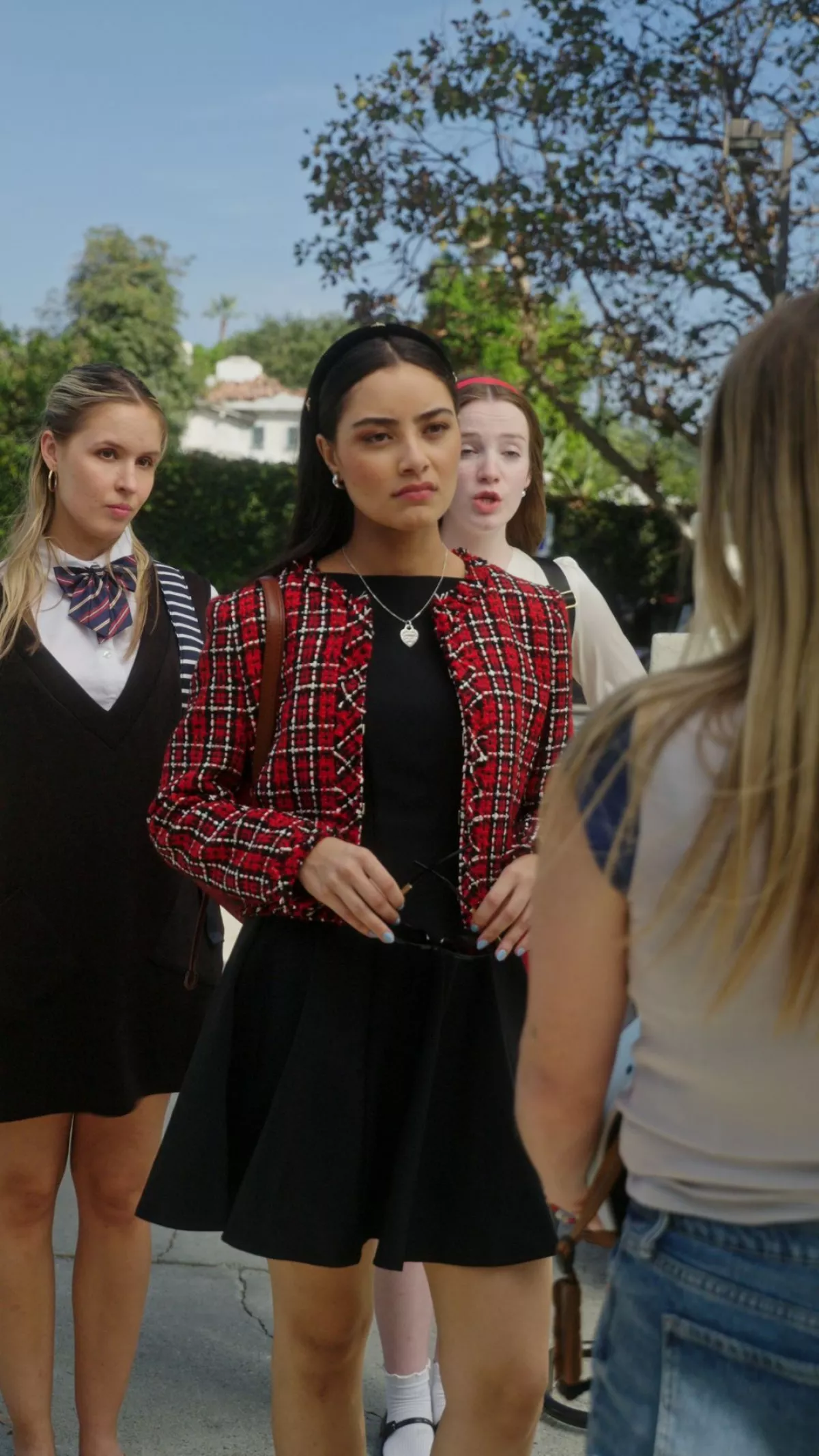 Candice Mathis (Liana Chau) poses as a wealthy teen in True Heiress vs. Fake Queen Bee.