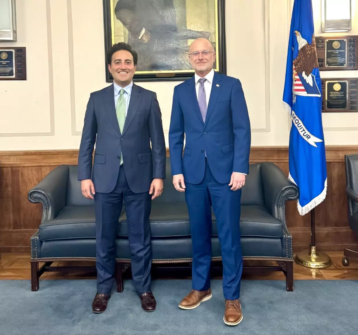 Federal Communications Commissioner Brendan Carr (right), shown in a photo with Acting U.S. Assistant Attorney General for the Antitrust Division Omeed Assefi. Carr posted the photo just three days after both government agencies green-lit local TV giant Nexstar's $6.2 billion deal to acquire rival Tegna. The move, supported by President Trump, faces headwinds in an antitrust lawsuit in federal court in California.