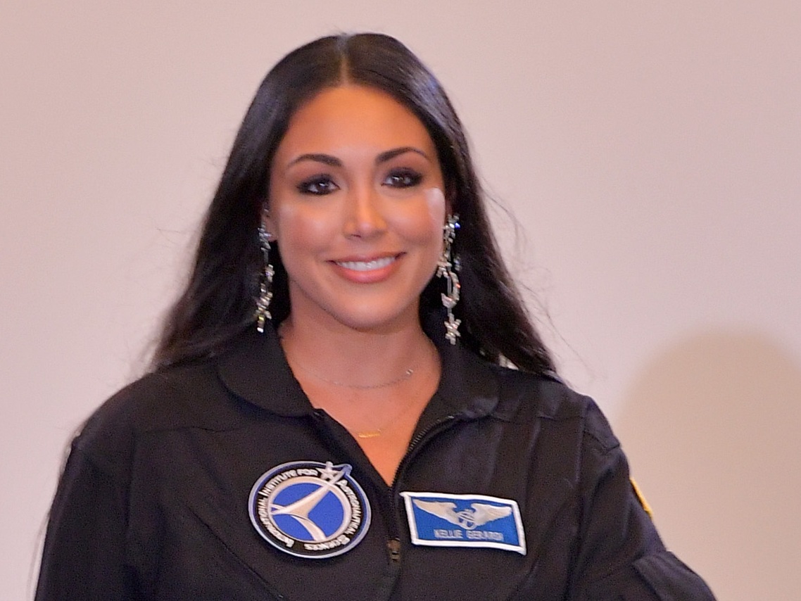 Struggling to have a second child, astronaut Kellie Gerardi uses her social media presence to let others know they