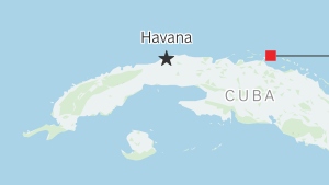 Cuba's military shot at a U.S.-registered boat Wednesday close to its shoreline, authorities said.
