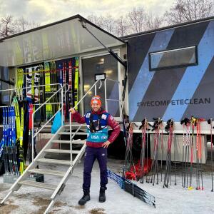 US cross-country ski team coach Matt Whitcomb with Yolanda the wax truck and some of the 600 pairs of skis it holds at a World Cup race in Goms, Switzerland Jan. 23, 2026