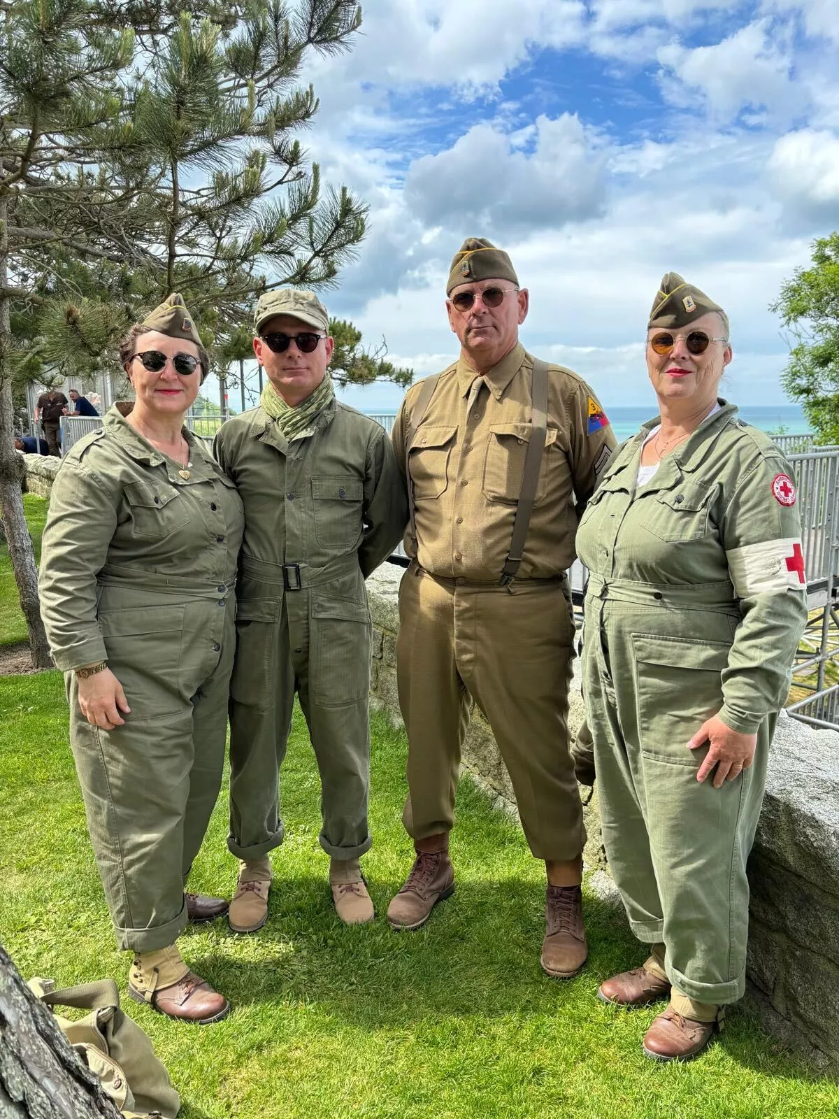 Jacquy Patrice with his with Dorothé and some friends, dressed as World War II-era U.S. soldiers, a Women’s Army Corps member and a nurse.