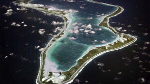 This image released by the U.S. Navy shows an aerial view of Diego Garcia, a remote island in the Indian Ocean.