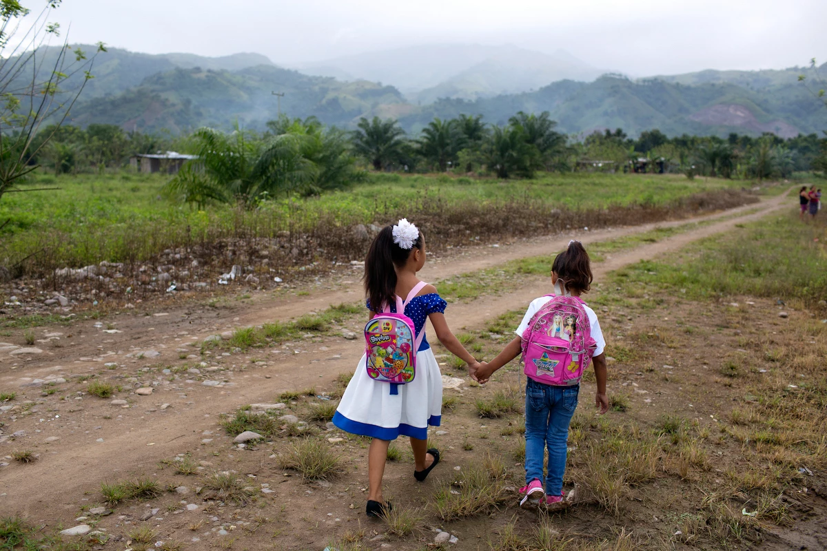 Walking to school in the Bajo Aguán region of Honduras, a region plagued by violence.