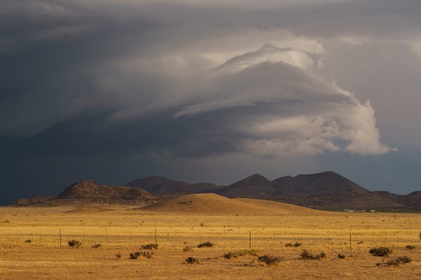 A storm cloud rolls in over the hills near McDonald Observatory in Fort Davis, Texas on Tuesday, May 27, 2025.
