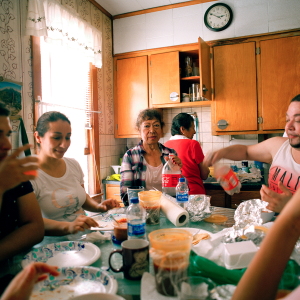 Jennifer Teresa Villanueva’s aunts, cousins, grandmother and uncle gather around the dining table for an afternoon brunch at home in Chicago in 2018.