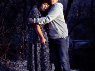 Oliver Villanueva hugs his sister, Jennifer Teresa Villanueva, at Zilker Park in Austin, Texas, during his winter break from college in 2022.