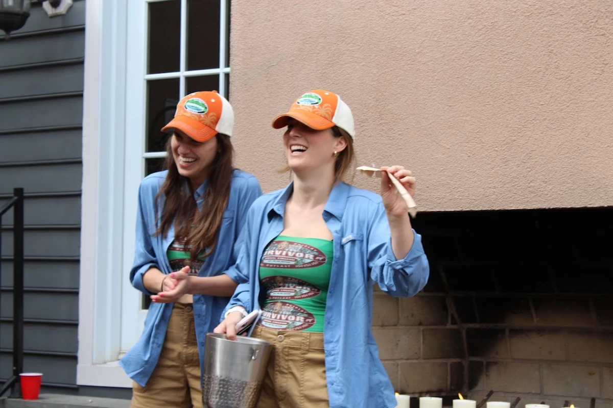 Care Shoaibi and Anna Wickham, role play as Jeff Probst — longtime Survivor host. They're reading the votes to see who will be eliminated from the game next.