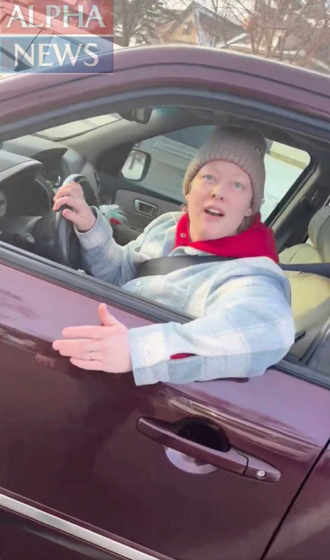 This image from video made by Immigration and Customs Enforcement officer Jonathan Ross via Alpha News shows Renee Good in her vehicle in Minneapolis on Wednesday, Jan. 7, 2026.