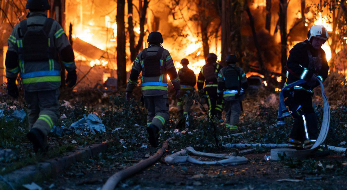 Firefighters battle against the fire broke out after Russian airstrike in Kyiv, Ukraine.