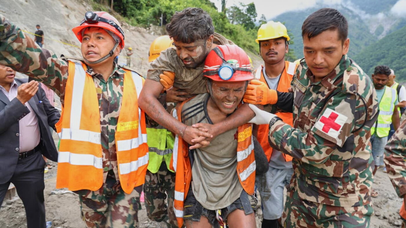 2 trapped workers rescued from a hydropower tunnel 9 days after Nepal floods
