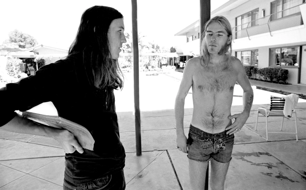 Cameron Crowe, left, speaks with Gregg Allman in 1973.