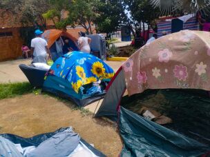 As aftershocks continued, Luz Noguera and her relatives spent two weeks sleeping in tents near her sister's home.