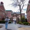 Students walk through Harvard Yard.