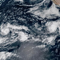 This satellite image from the National Oceanic and Atmospheric Administration (NOAA) shows Tropical Storm Nolo, left, south of Hawaii; Hurricane Odalys, middle, and Hurricane Polo, right, off the coast of Mexico, in the Pacific Ocean on Thursday, Sept. 24, 2026.