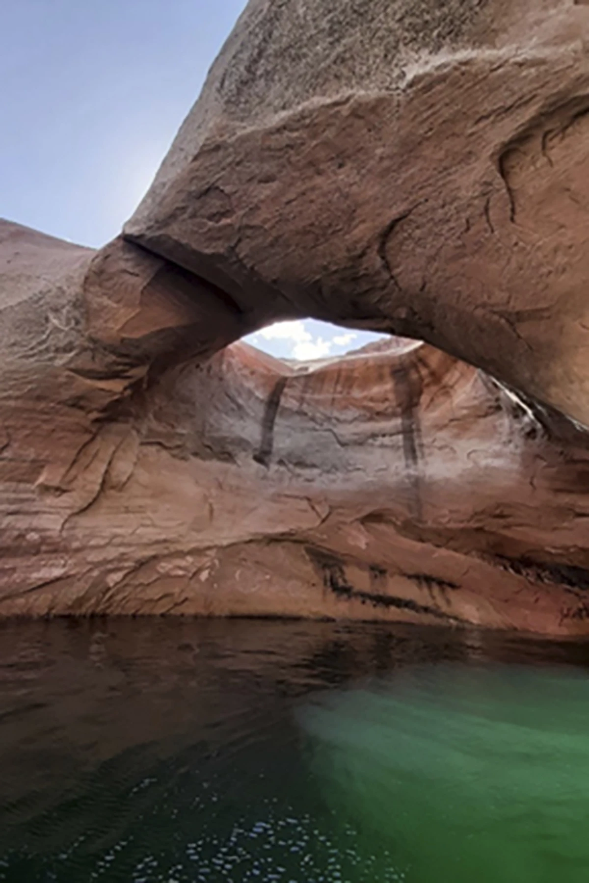 This undated photo provided by the National Park Service shows Double Arch before it collapsed in Rock Creek Bay, part of the Glen Canyon National Recreation Area in Utah, last week.
