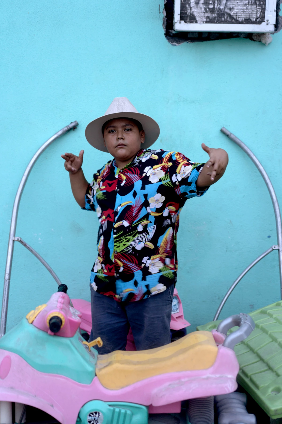 Jeffrey Alexander Pérez Rivera, nearly 8 years old, poses for a portrait on Aug. 23, 2023. He is a member of Unión de Cumbia, a group of young people who dance cumbia 'regia' in Monterrey.