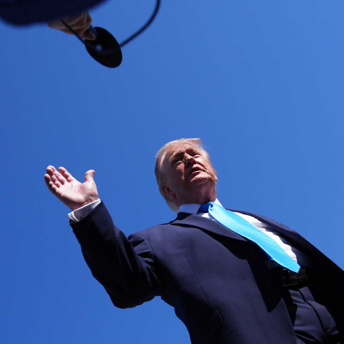 President Donald Trump speaks to the press before boarding Air Force One, Wednesday, May 20, 2026, at Joint Base Andrews, Md., en route to speak at the U.S. Coast Guard Academy commencement.