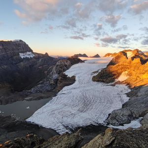 A Swiss glacier shows the effects of years of ice loss, with exposed rock replacing ice that once covered the landscape.