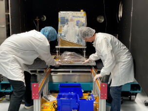The prototype satellite was tested in a thermal vacuum chamber that simulates the environment in space.