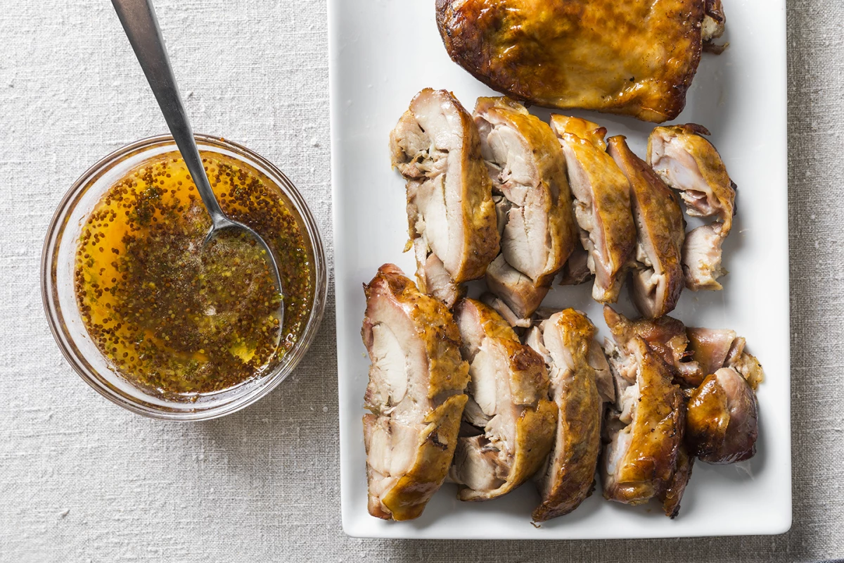 Turkey Thigh Confit is a delicious main course that you can make well ahead of Thanksgiving.