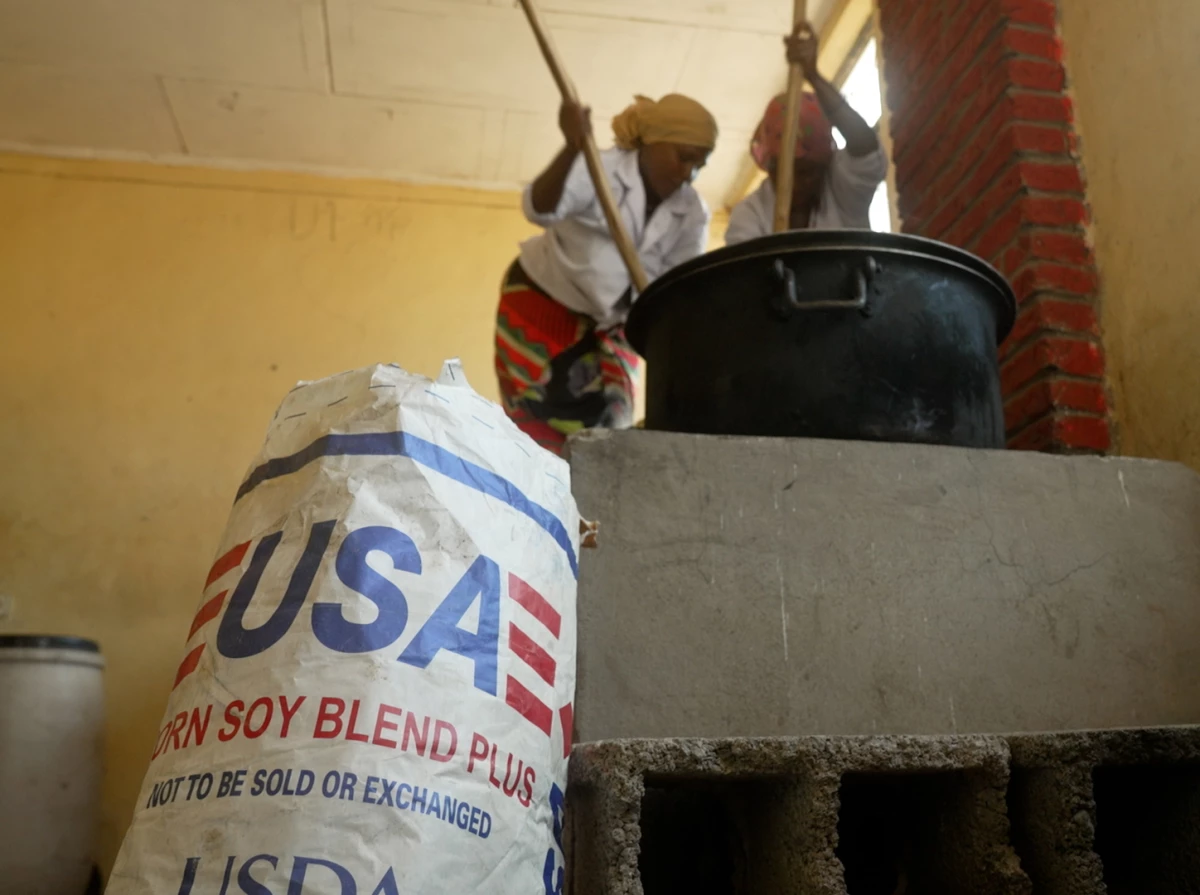 Workers prepare food at the Anderkelo primary and middle school in Ethiopia's Afar region, where a U.S.-supplied blend of corn and soy distributed by the U,N,'s World Food Programme provides a daily meal for hundreds of students in a region where food access is severely limited.