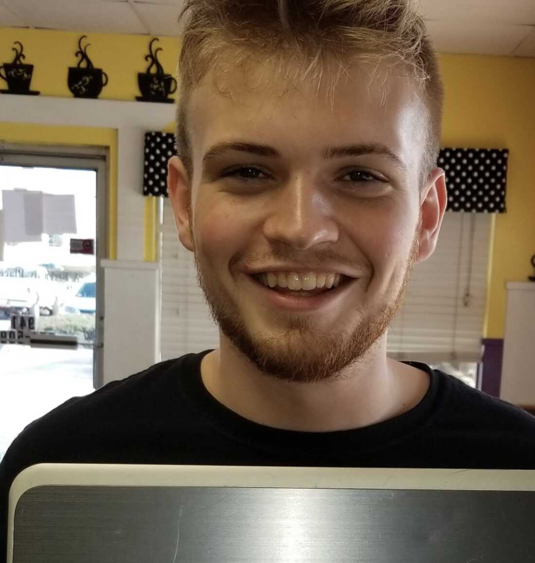 Craig Clark donated a laptop to Chris Roberts (pictured here) to use for college.