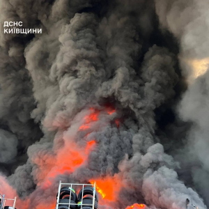 In this photo provided by the Ukrainian Emergency Service, firefighters put out a fire in a warehouse following a Russian drone attack near Kyiv, Ukraine on Saturday.