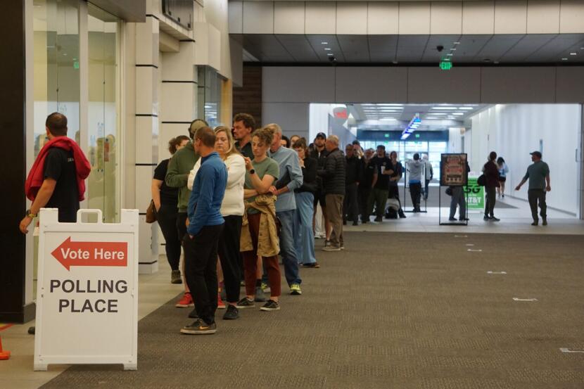 Voters line up on Aug. 17, 2026, at the early voting station set up in Anchorage's Midtown Mall. Voters reported waiting about an hour to cast their primary election ballots.