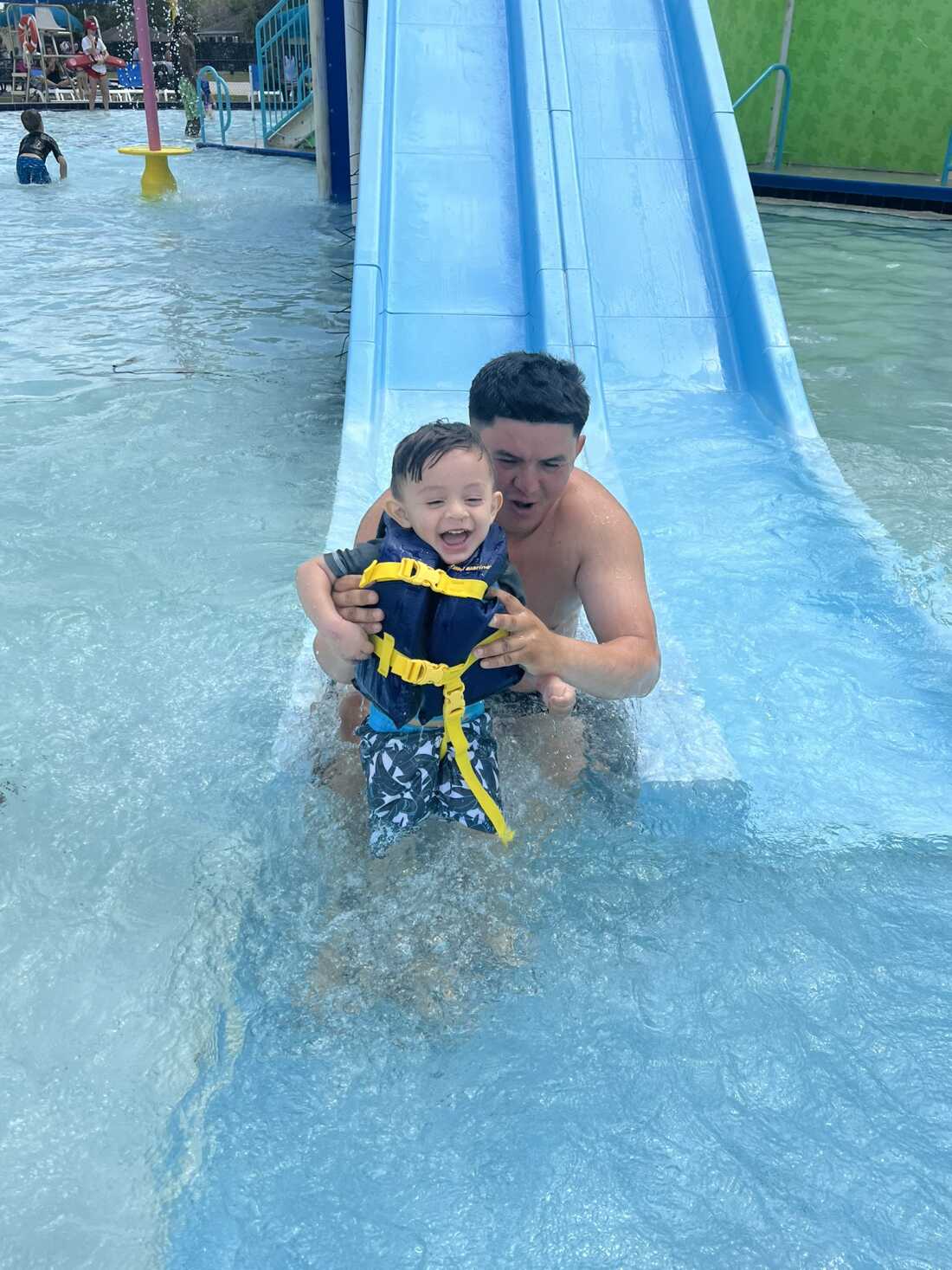 Wilmer Vasquez plays with his son.