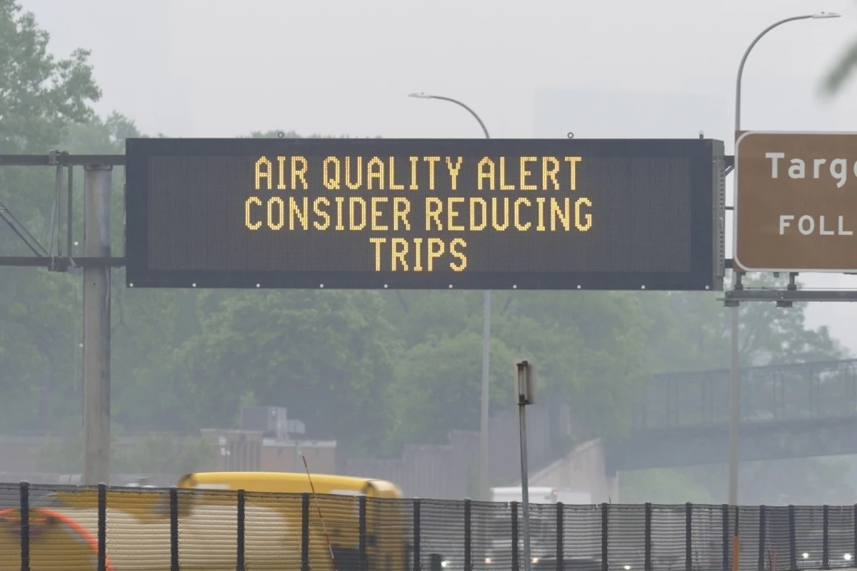 A sign warns of an air quality alert as smoke from wildfires burning in Canada reaches Minneapolis on Tuesday.