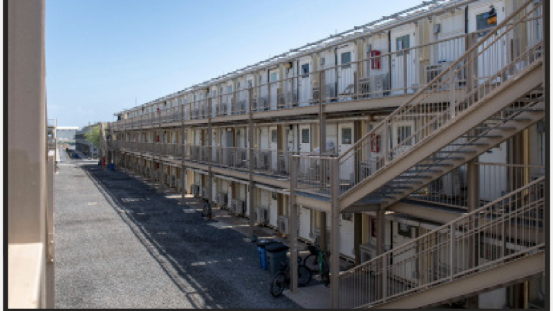 Camp Lemonnier uses stacks and rows of "Containerized Living Units,” or CLUs, which the military likens to shipping containers, to house thousands of personnel at the U.S. base in Djibouti. A group of migrants is being held in a converted shipping container, according to court filings.