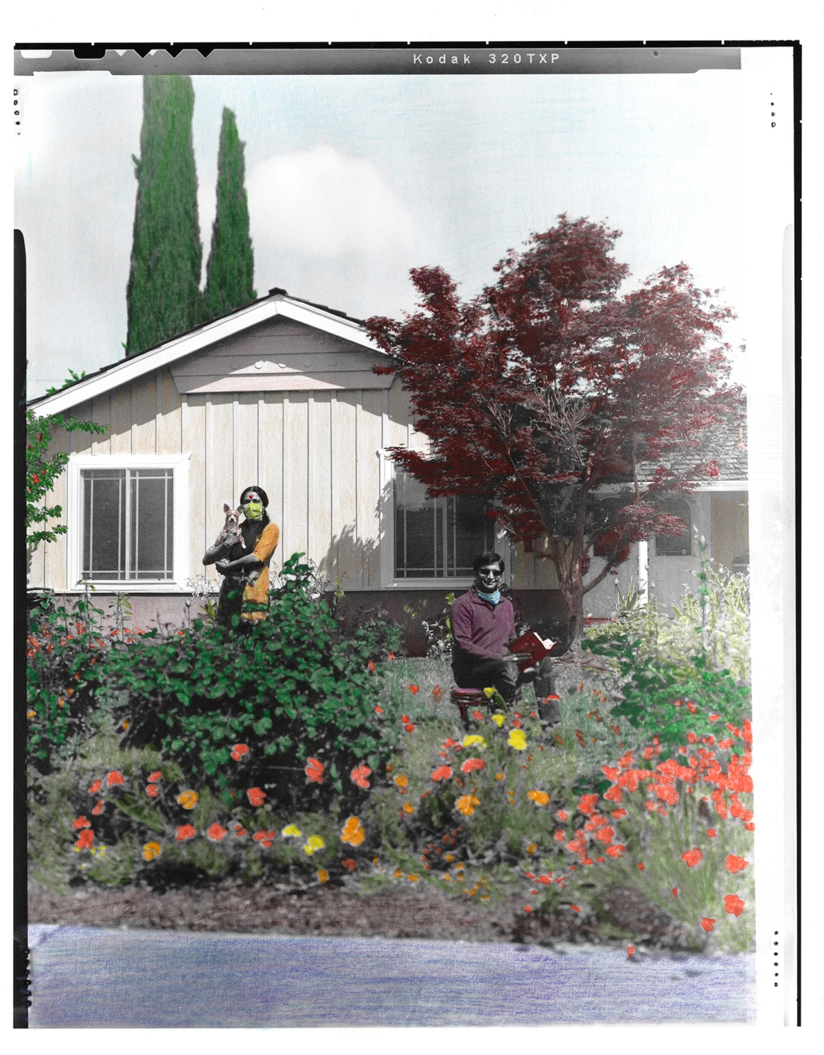 Nitya Kansal (left) and her husband, Arvind Kansal (right), pose in front of their home in Cupertino, Calif.