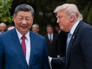 President Trump speaks with Chinese President Xi Jinping while leaving after a visit to the Zhongnanhai Garden in Beijing, May 15.